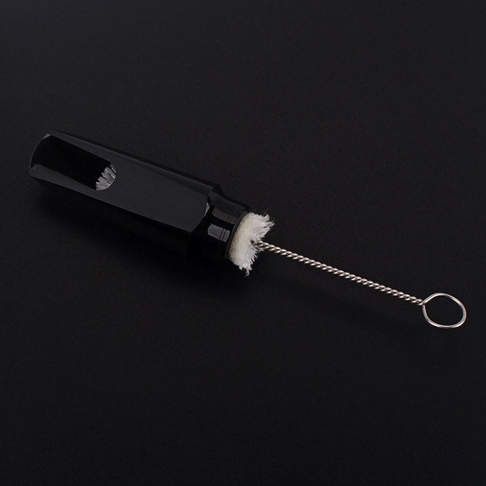 Musical Instrument You Blow Into - 2 adet saksafon ağızlık mermi şekli